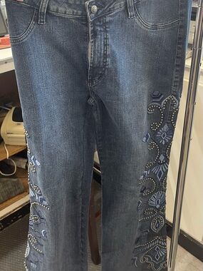 Embroidered Indigo Flare Jeans with Decorative Studwork